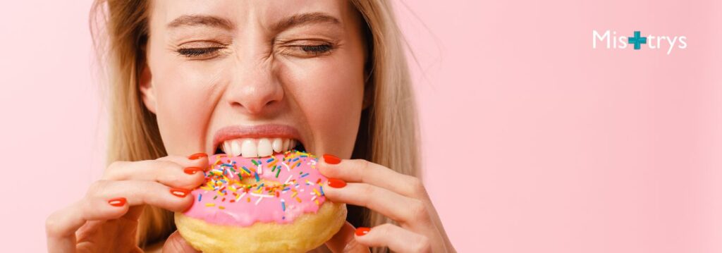 Woman eating a doughnut