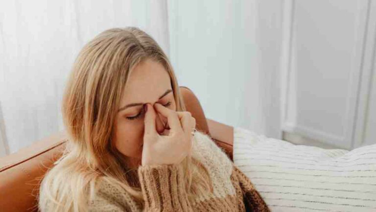 Woman with sinus pain