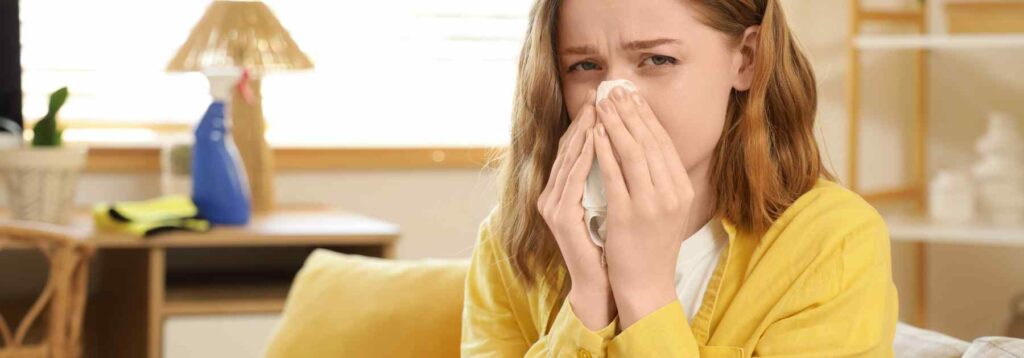 Woman struggling with allergies