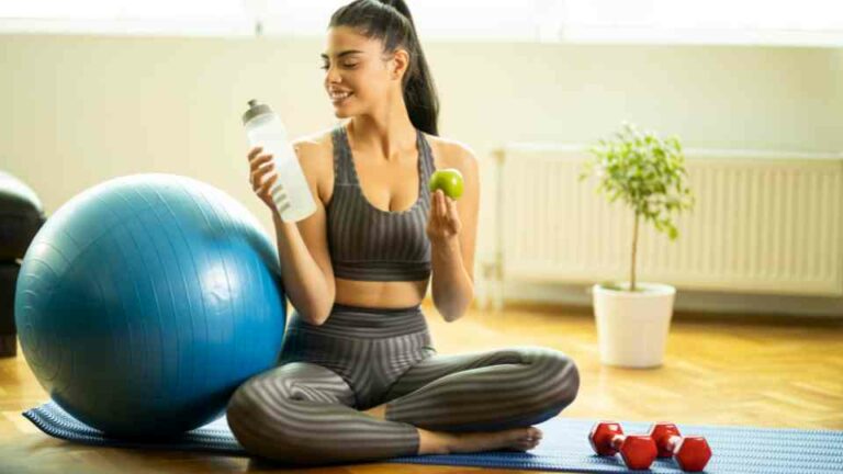 Happy woman losing weight with lifestyle changes like diet and exercise