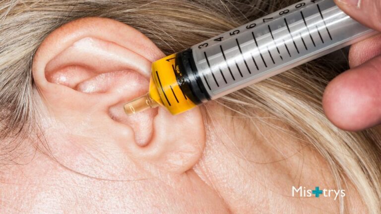Olive oil in ear for wax softening